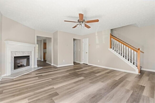 Building Photo - 5696 Windfall Ln