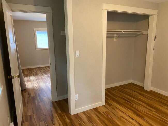 View from bedroom back to living space - 15539 Ashworth Ave N