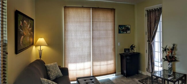 Living room area, not as yellow in real life - 170 Kuli Puu St