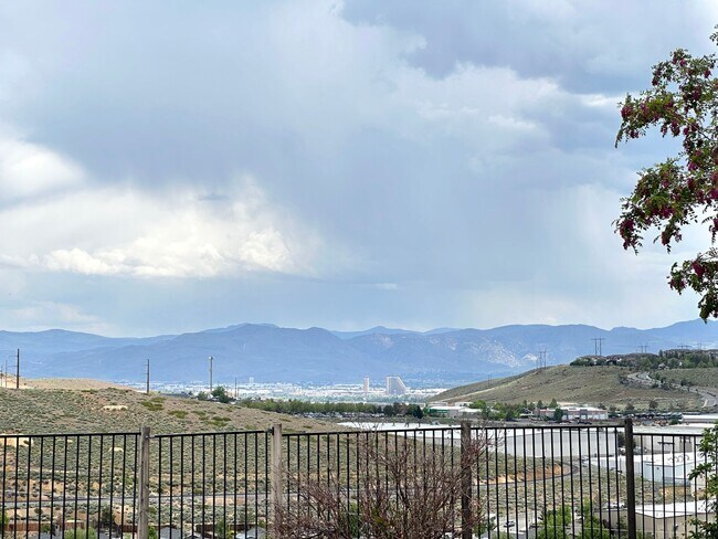 Building Photo - 4 bedrooms, 2 1/2 Baths with a 3 Car Garag...
