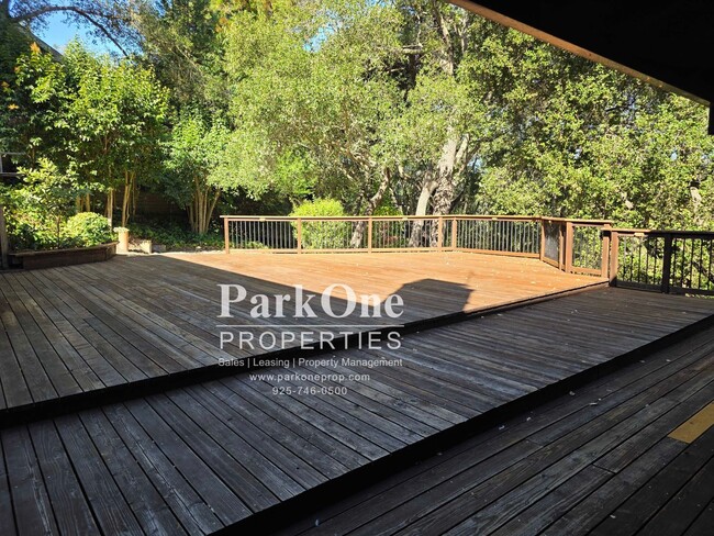 Building Photo - Spacious Home on a Private Wooded Lot Now Available!