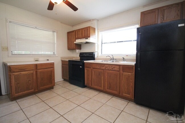 Building Photo - 703 N 72nd Ave