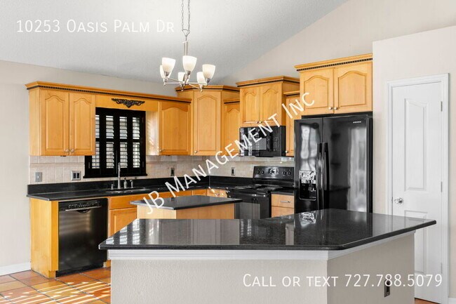 Building Photo - 10253 Oasis Palm Dr