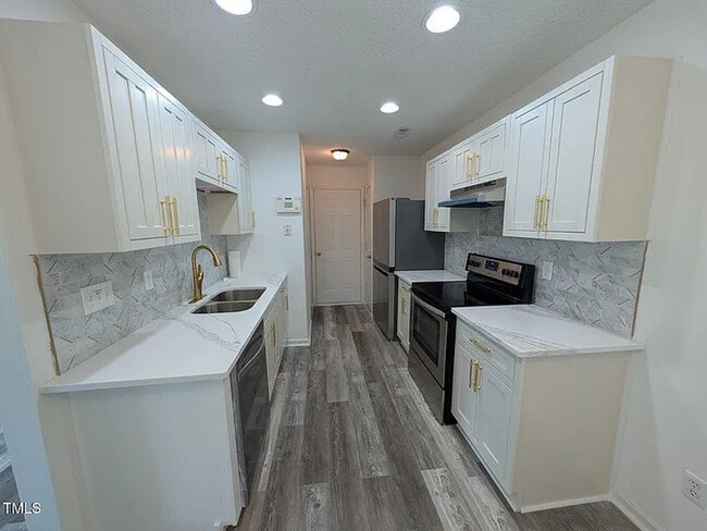Building Photo - Earn Wealth While Leasing - Like a Homeown...