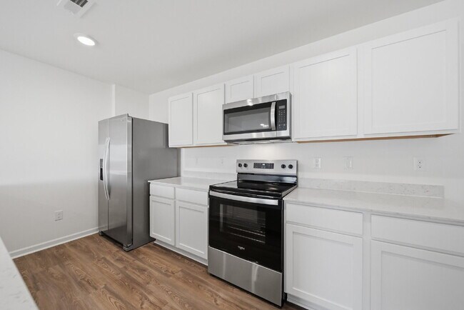 Building Photo - Modern Comfort in a Peaceful Newton Community This newly built 3-bed, 2.5-bath townhome blends mo...