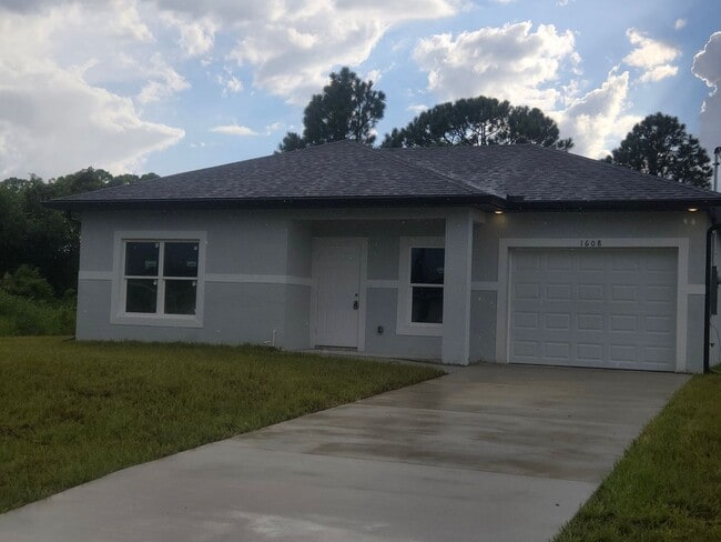 Building Photo - Brand New 2/2/1- SW Lehigh Acres