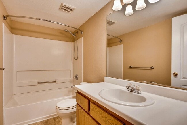 Building Photo - Heat included!  1 car garage!  Vaulted Cei...