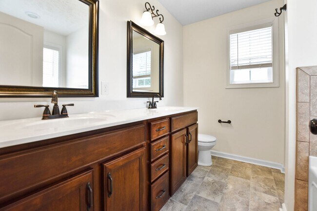Building Photo - Pet Friendly Three Bedroom with Bonus!