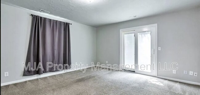 Building Photo - 5674 Magic Isle Ln
