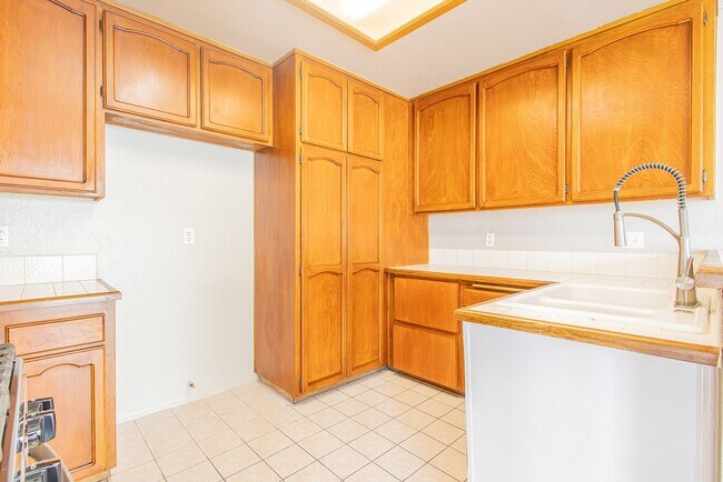 Building Photo - Spacious Single-Story 3-Bedroom Condo with Private Patio and 2-Car Garage