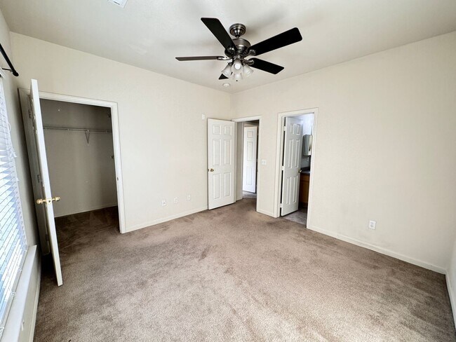 Building Photo - Home Near UNR: Spacious 4BR/4BA with Gated Access and Balcony!
