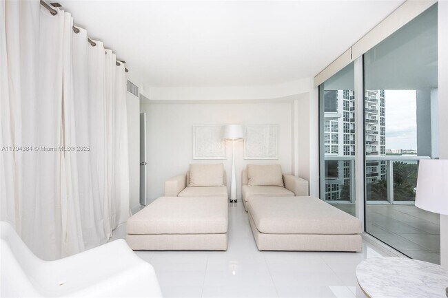 Building Photo - 10275 Collins Ave
