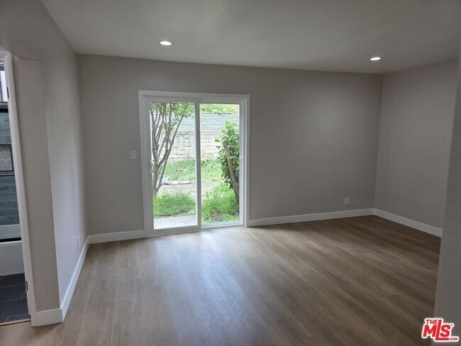 Building Photo - 14747 Woodruff Ave