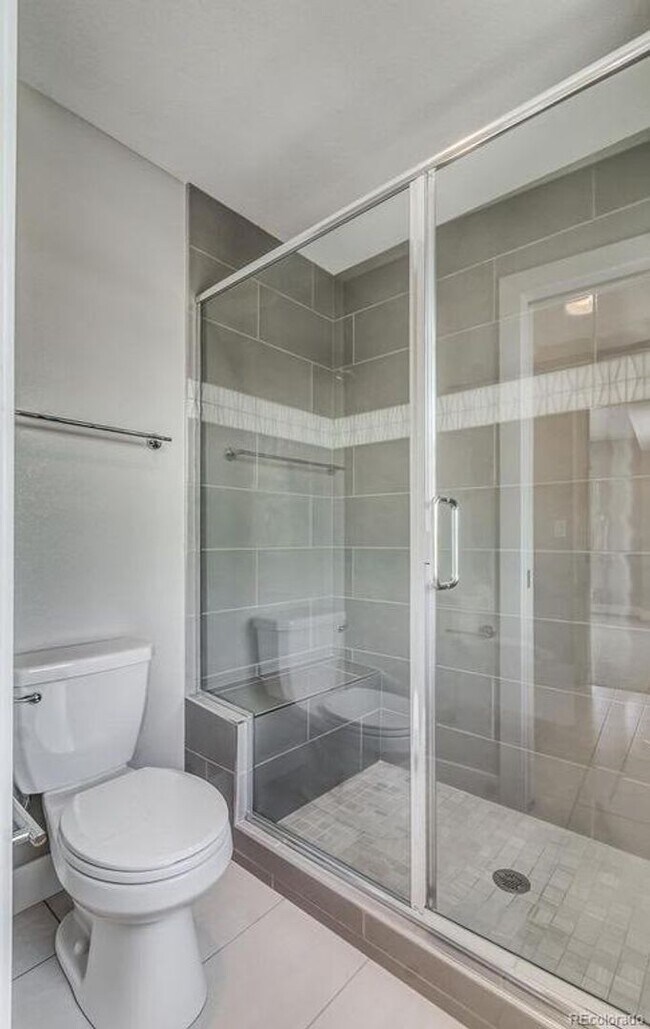 Building Photo - Luxurious End-Unit Modern Townhome at 5360...