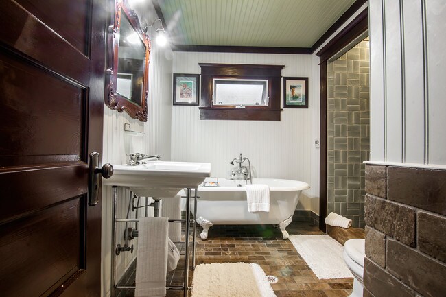 Bath with claw tub and stall shower - 312 Manhattan Ave