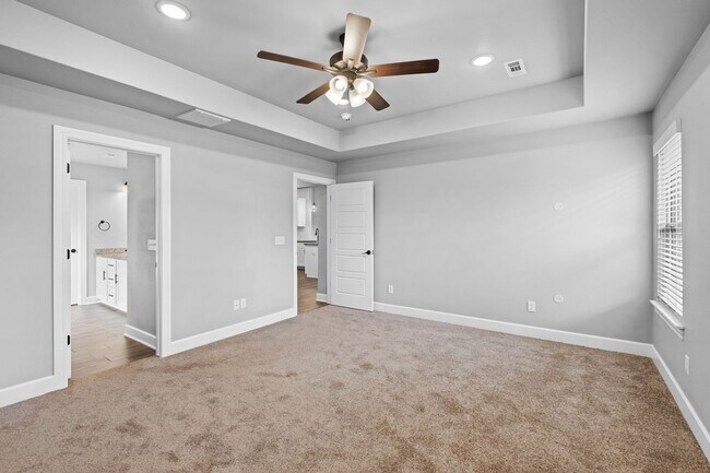 Building Photo - Spacious 4-Bedroom Home with Open Layout, ...