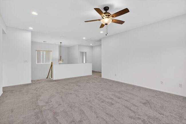 Building Photo - CORNER LOT 4-BEDROOM HOME + LOFT  WITH 3.5 BATHS AND 3-CAR GARAGE!