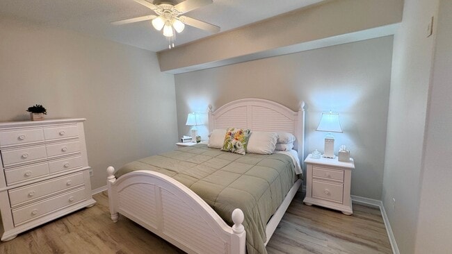 Building Photo - Elevated Luxury at The Terraces – 4th Floor Lake & Golf Course Views! 55+ Community!