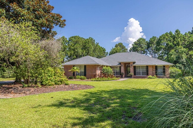Building Photo - "Coastal Elegance Awaits: Spacious 4-Bed Oasis with Granite Touches on Shipwreck Road"