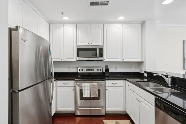 Building Photo - Fully Furnished 2BR Condo with Designer To...