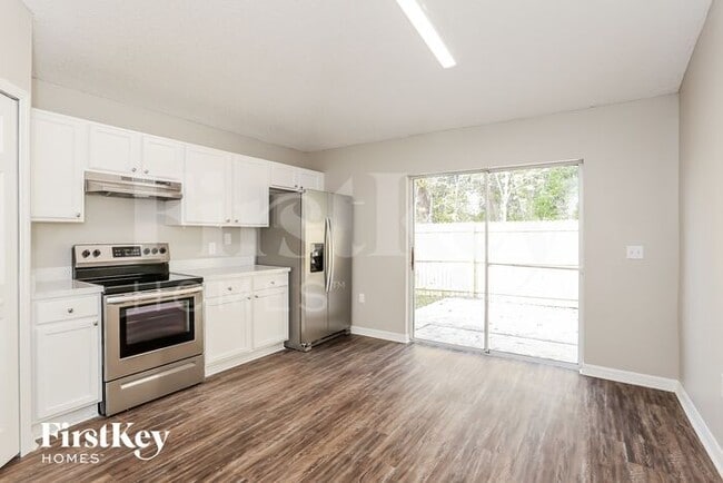 Building Photo - 6671 Gentle Oaks Dr N