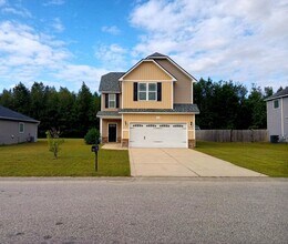 Building Photo - Stylish Two-Story in the dreamy Riverbrook...