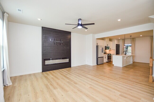 Building Photo - 3 Bedrooms | 2.5 Bathrooms | Lower-Level Flex Room | Approximately 1,978 Square Feet | 2-Car Gara...
