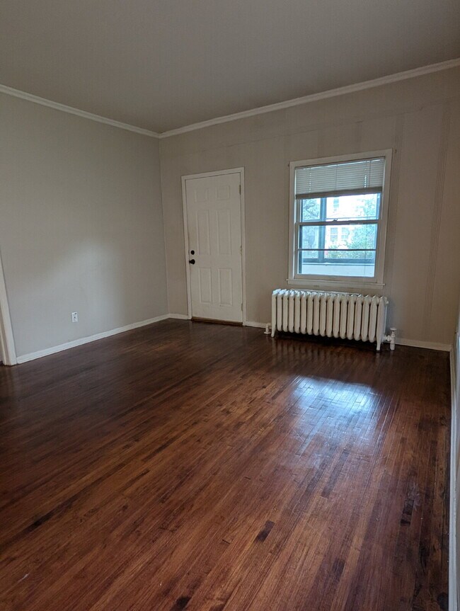 Building Photo - Bright & Charming 3BR With Garage Included In NE Minneapolis