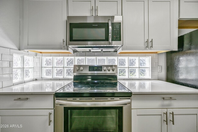 Building Photo - 3065 N 67th Ave