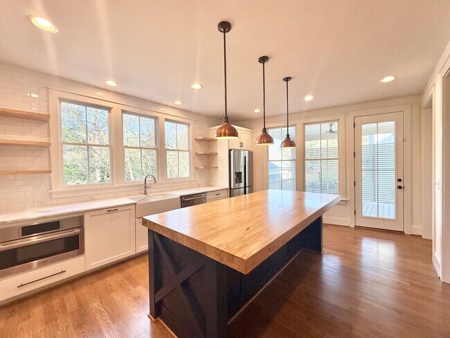 Building Photo - Custom Built 4BD, 3.5BA Five Points Home with a Bonus Room & Fenced Yard