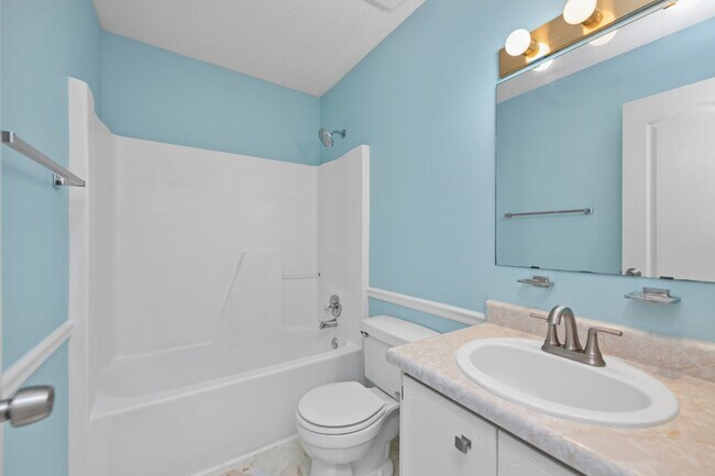 Building Photo - Spacious 3BR Retreat with Soaring Ceilings & Screened Porch