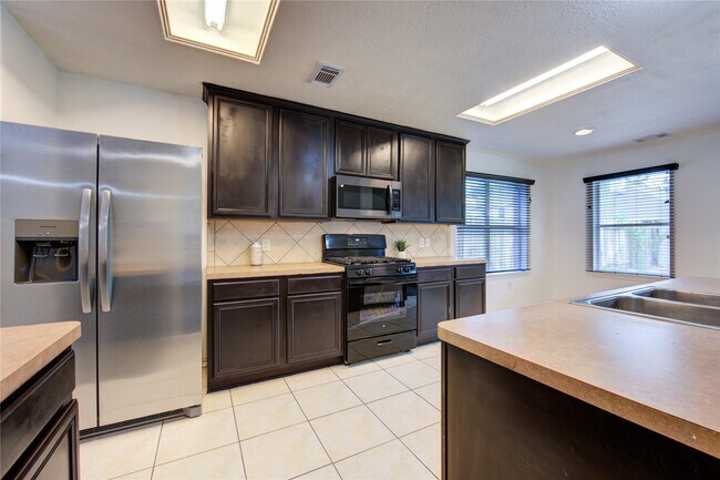 Building Photo - 5010 Moss Garden Ln
