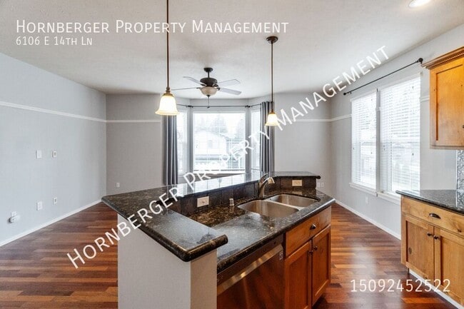 Building Photo - 6106 E 14th Ln
