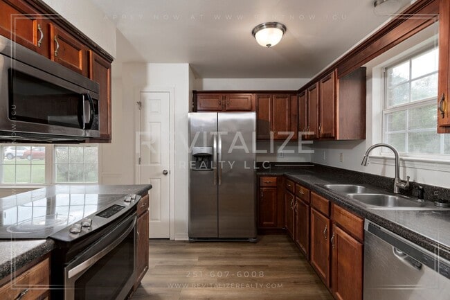 Building Photo - Spacious 3-Bedroom Home with Open Floor Plan and Big Backyard in West Mobile!