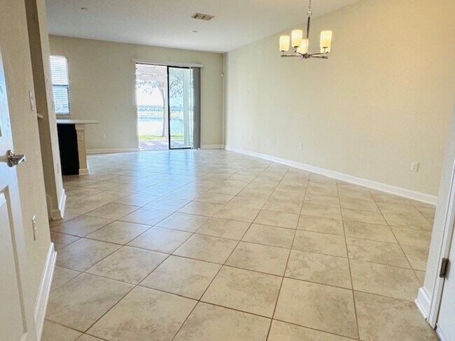 Building Photo - For Rent in ChampionsGate 3/2.5 Townhouse with Water View
