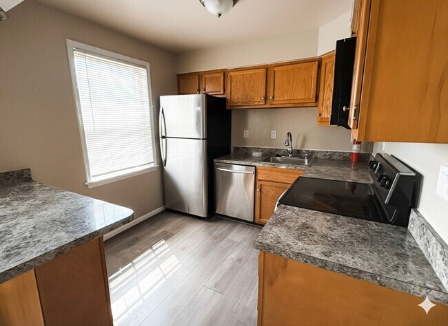 Building Photo - Furnished 1-Bedroom Condo in Fairfax Villa...