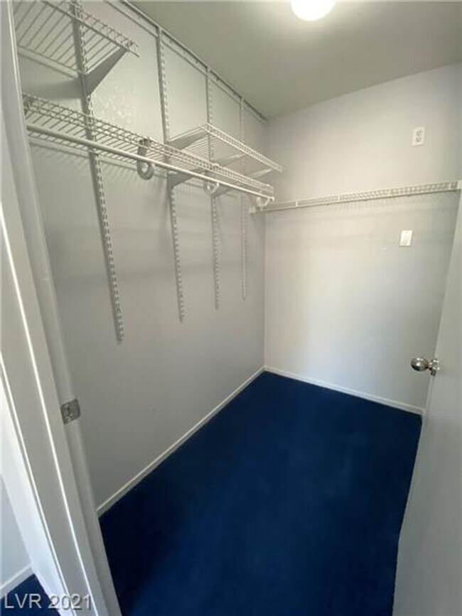 Building Photo - Cozy 1-Bed Condo in Gated 89128 Community ...