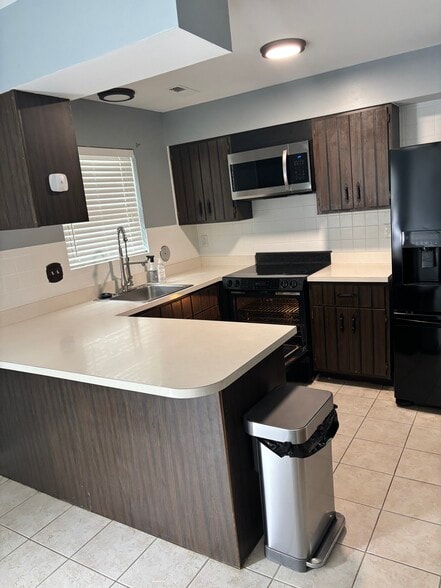 Ample ichen cabinet storage (currently being updated) - 825 Dumont Pl