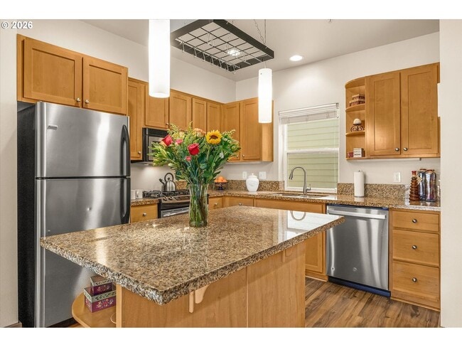 Building Photo - Main Street Living with Granite Kitchen, Gas Fireplace, and MAX Line Access