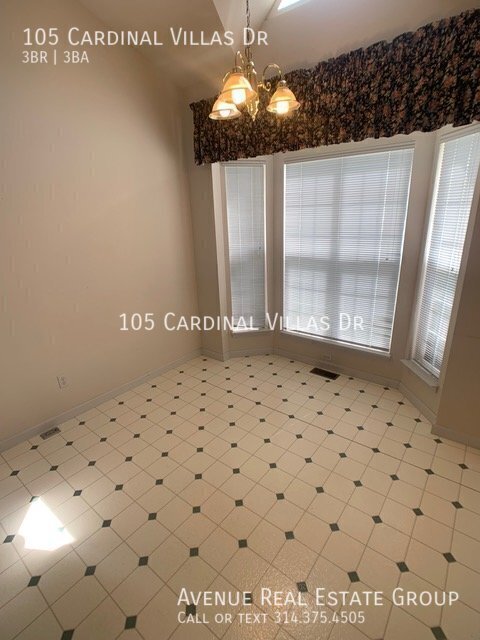 Building Photo - Spacious 3-Bed Condo with Bonus Room & Gar...