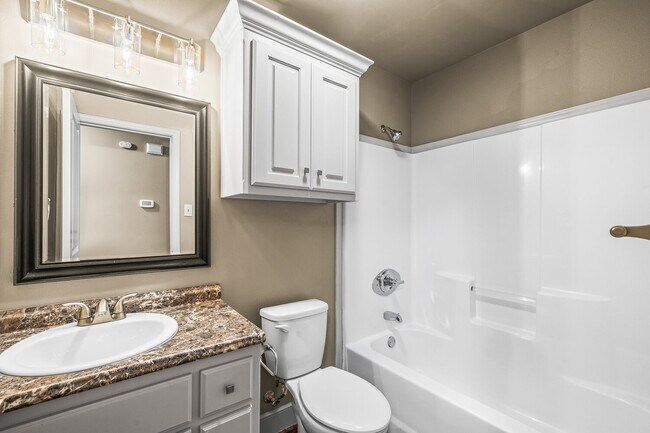 Building Photo - Spacious 3BR/2BA Duplex with 2-Car Garage & Stainless Appliances