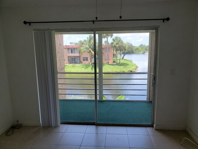 Building Photo - Desirable 55 plus community condo unit with a view of the lake on the 2nd Floor.