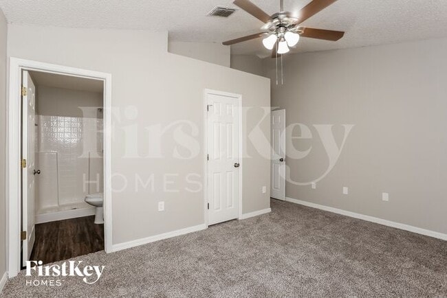 Building Photo - 6671 Gentle Oaks Dr N