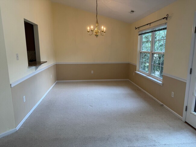 Building Photo - Location! 4 bedroom with garage convenient...