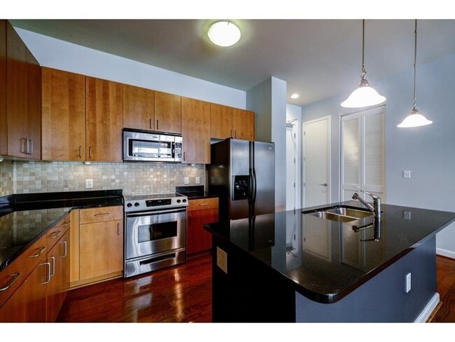 Building Photo - 711 Cosmopolitan Dr NE