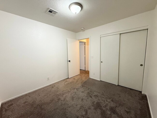 Building Photo - $500 OFF 1ST MONTHS RENT Updated 3-Bedroom Townhome in Gated Community with Pool Access