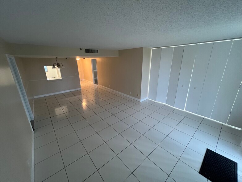 Enclosed Den to the right - 6400 NW 2nd Ave