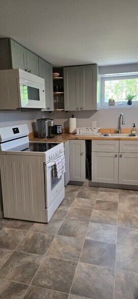 Kitchen with butcher block counter tops - 5220 Jacksboro Pike