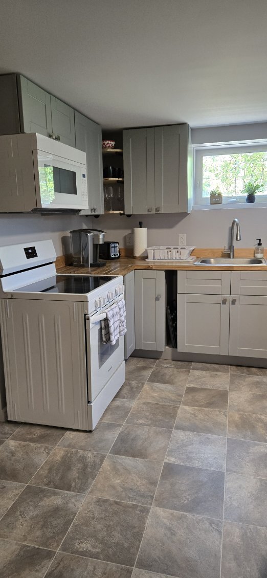 Kitchen with butcher block counter tops - 5220 Jacksboro Pike