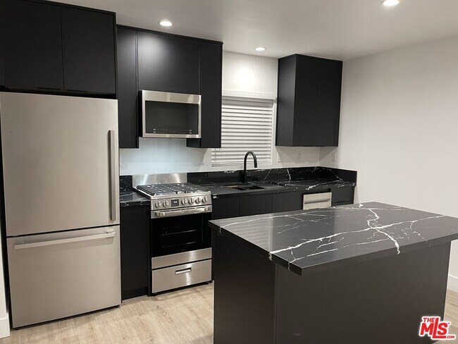 Building Photo - 9504 Gothic Ave